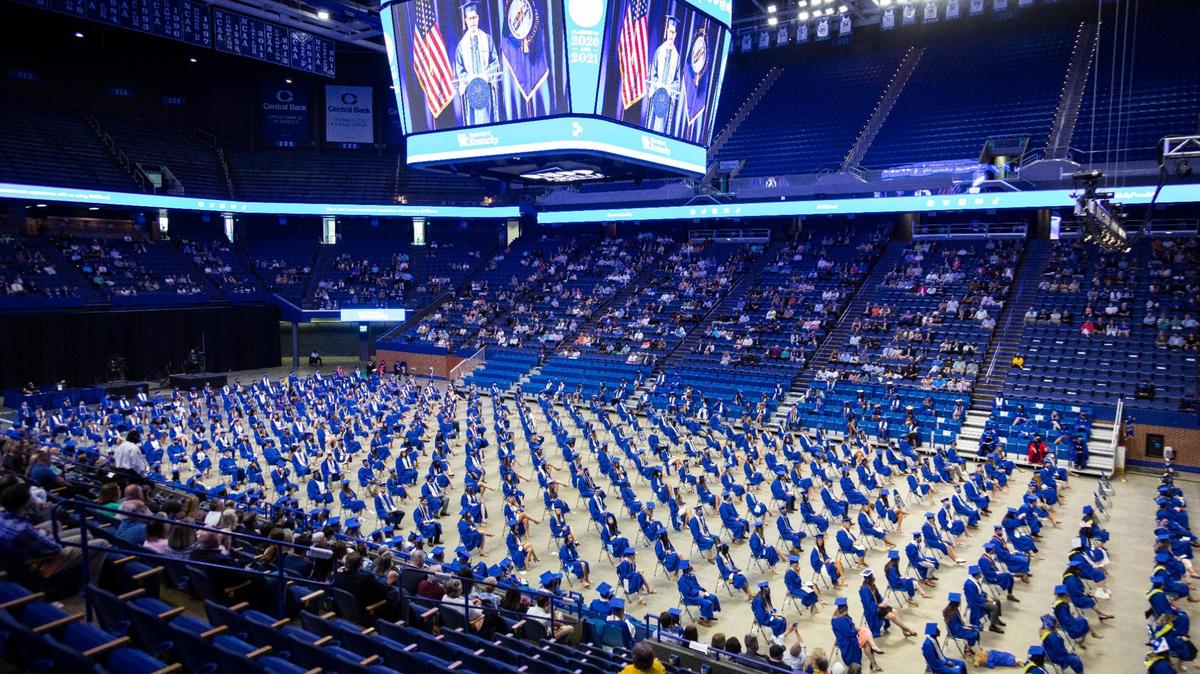 Graduates sit spaced out during the University of Kentucky commencement ceremony at Rupp Arena in Lexington, Ky., Sunday, May 16, 2021.