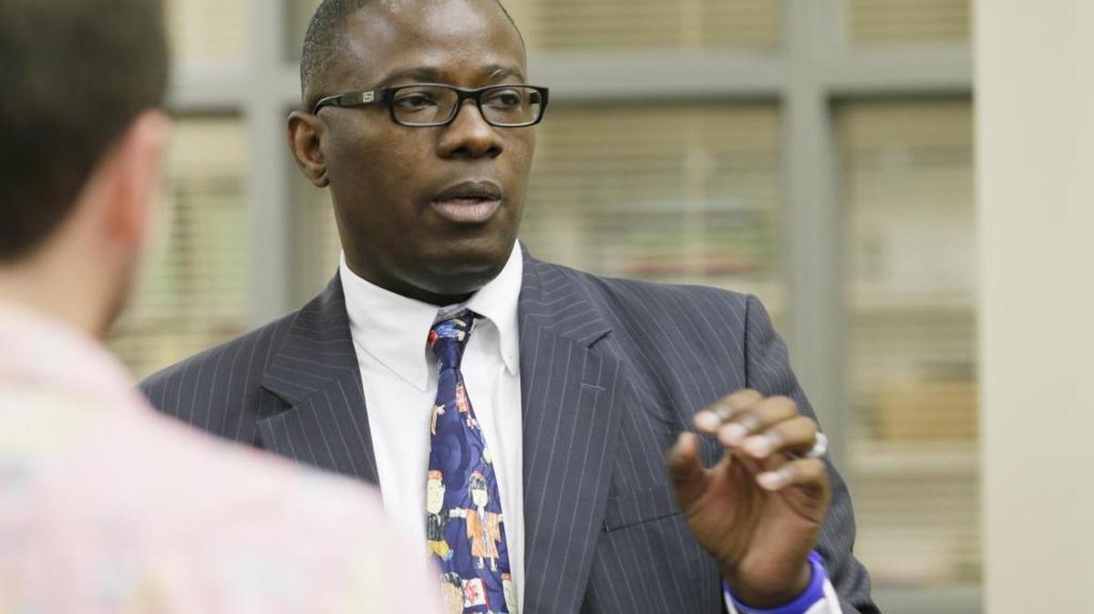 Superintendent Manny Caulk talked to students in the library of Bryan Station High School on Aug. 12.