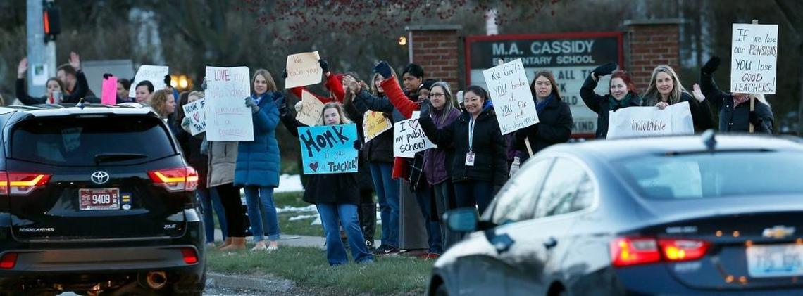 Teachers and other supporters at M.A. Cassidy Elementary gathered outside the school Thursday morning to participate in a county-wide walk-in designed to make legislators aware of their concerns around Senate Bill 1 and the proposed state budget. They stood in front of the school with signs as families and students arrived for the start of school.