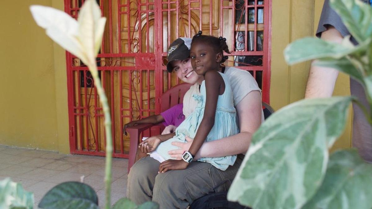 UK architecture student Abbi Evans sat with Taseline, 9, at the Chez Moi Orphanage in the Bon Repos neighborhood of Port Au Prince, Haiti.