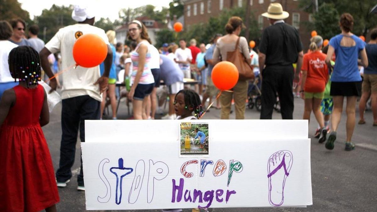 Participants gathered in the parking lot at Second Presbyterian ahead of the walk.