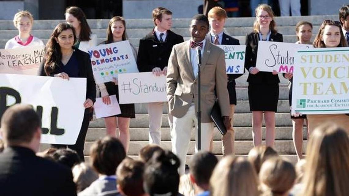 Andrew Brennen, a 2014 graduate of Lexington’s Paul Laurence Dunbar High School, at the microphone.