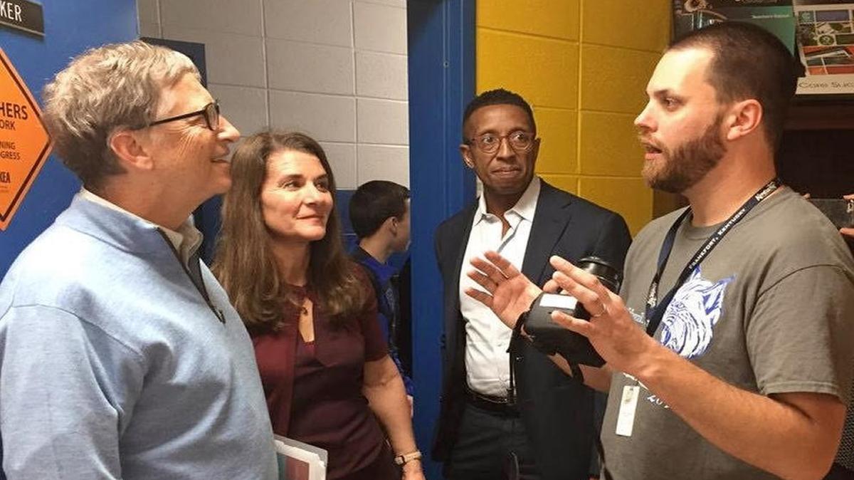 Teacher Ricky Thacker talked to Bill Gates, left and Melinda Gates during the Gateses’ Nov. 4 visit to Betsy Layne High School in Floyd County.