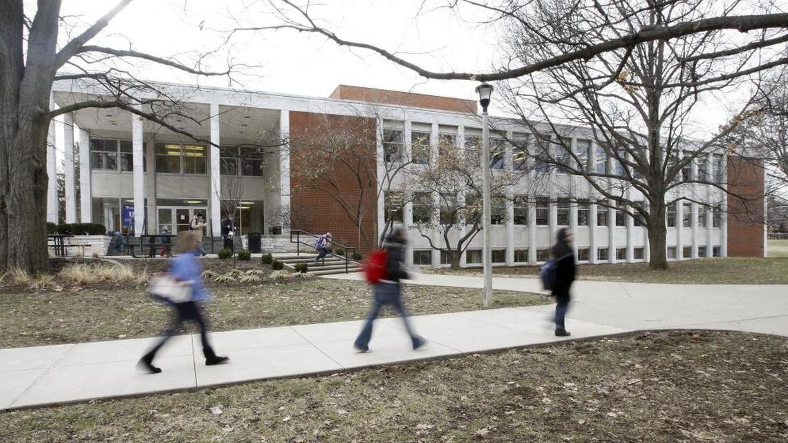 Students walked past the University of Kentucky College of Law. The 1965 building is due to be renovated and expanded in a $56 million project, starting this summer.