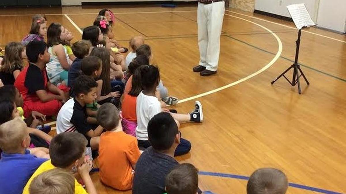 Mike Acord shared his love of music with third-grade students at Garth Elementary School in September.
