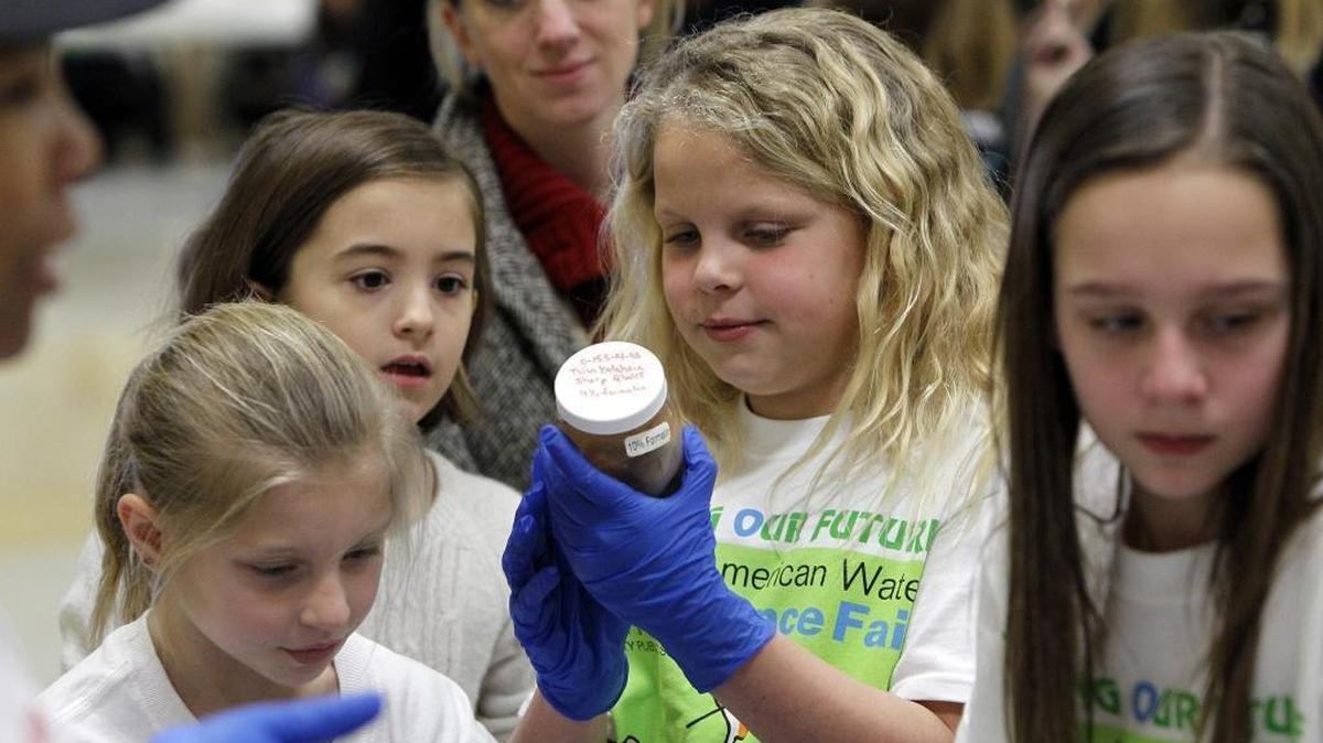 Madison Wilson, 10, looked at a vial containing sheep fetuses. The specimens were presented by Delta Sigma Theta's Project See in the Discovery Zone exhibition.
