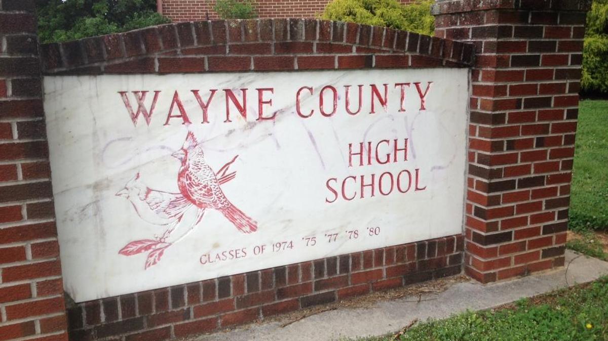 This sign at Wayne County High School was allegedly defaced during a senior prank that resulted in felony charges against 18 students.