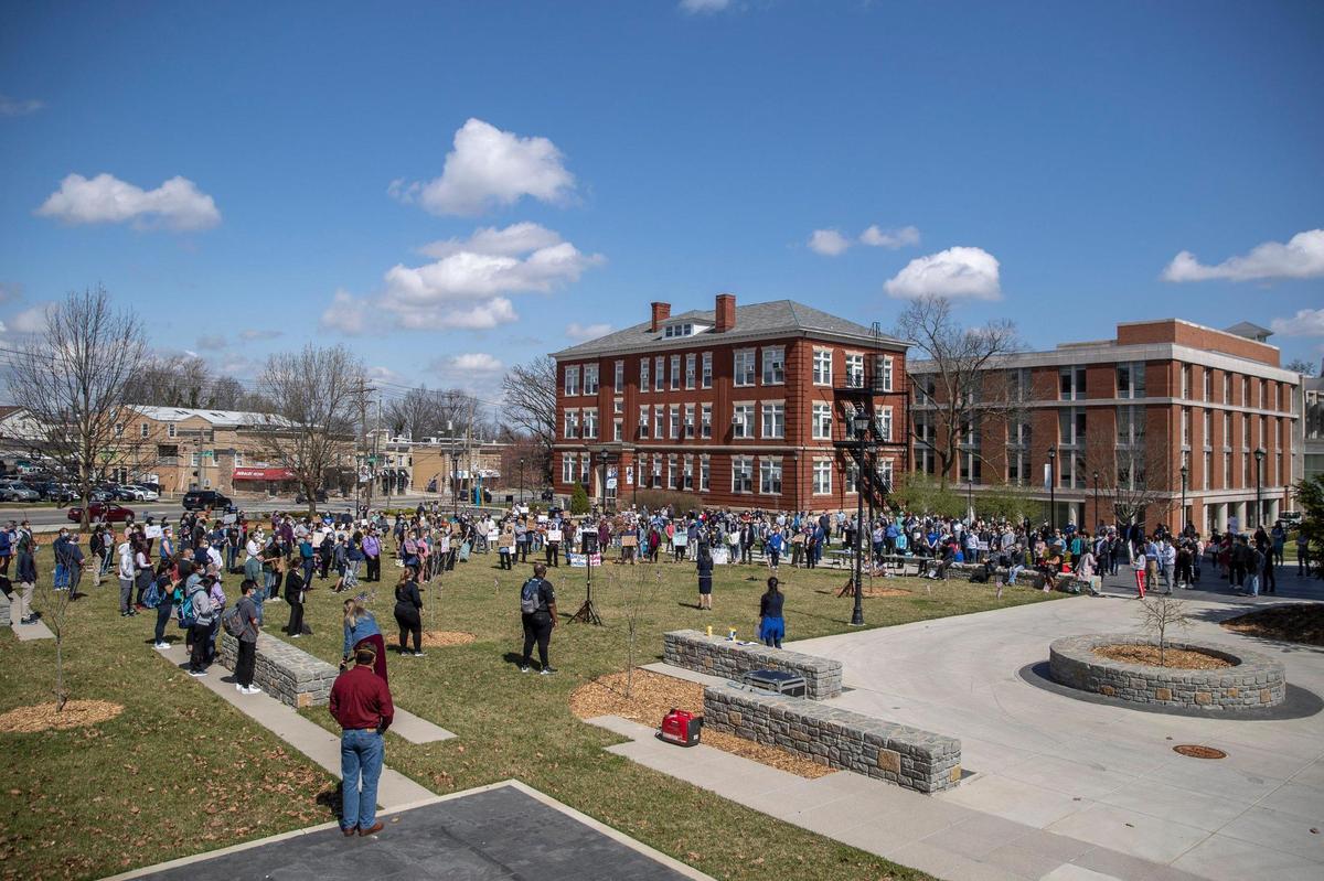 Hundreds of University of Kentucky students, staff and faculty attend a Stop Asian Hate rally on the front lawn of Memorial Hall on the campus in Lexington, Ky., on Wednesday,March 24, 2021.