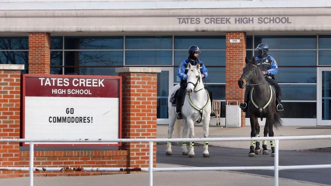 Lexington Police Mounted Patrol Sgt. Joseph Eckhardt, left, and Officer Marty Parks patrolled on the Tates Creek High School campus in Lexington Tuesday. The Lexington Police Department is taking steps to increase visibility in the area around the school after three students brought guns to school and one juvenile was shot in a nearby neighborhood.