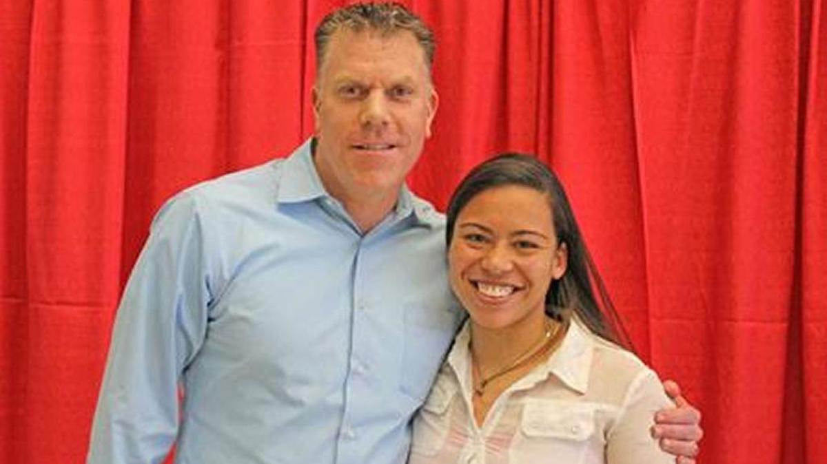 Bryan Station High School senior Brittnany Graham, right, with FAME Award winner Darrin Master