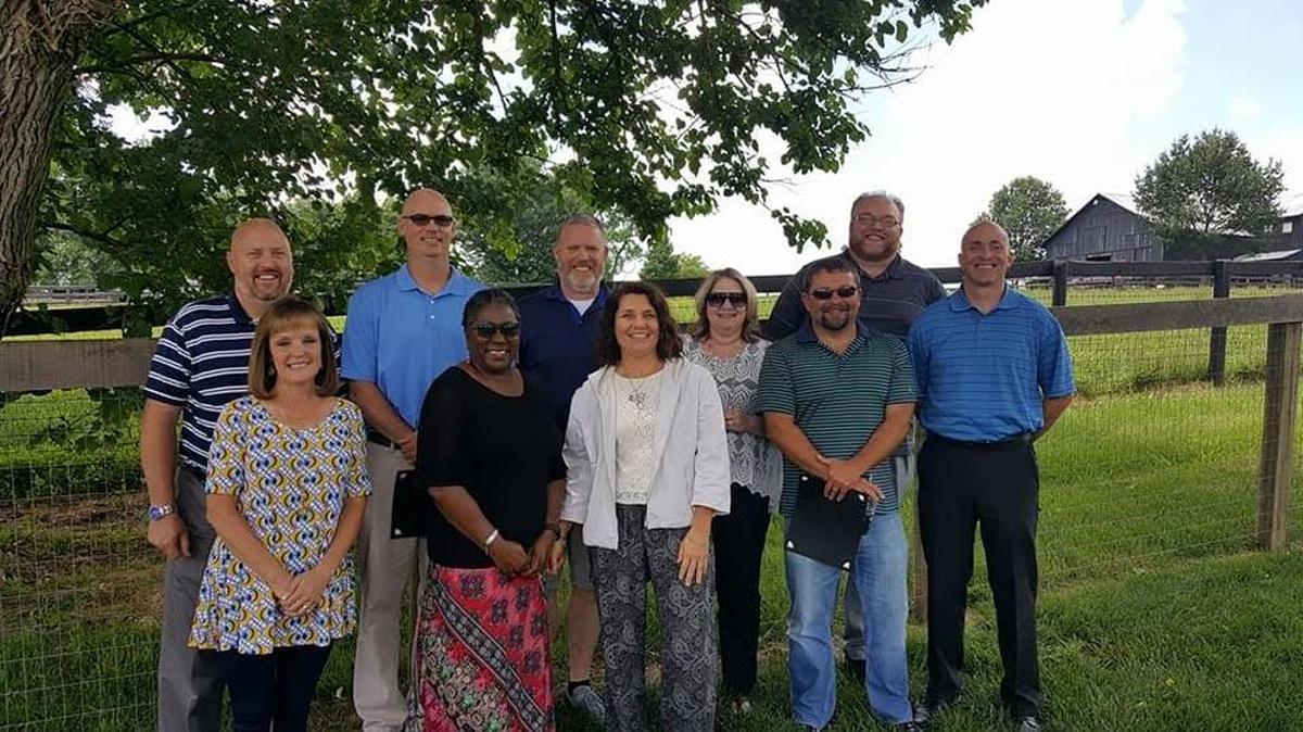 Several school administrators earned advanced credentials from the National Institute for School Leadership. From left, Michael Godbey, Gwen Lawson, Ty Howard, institute facilitator Edna Thomas, Thad Elmore, institute facilitator Yvonne DiMattia, Elaine Kaiser, Jeff Craiger, James Carrier and Jason Radford.