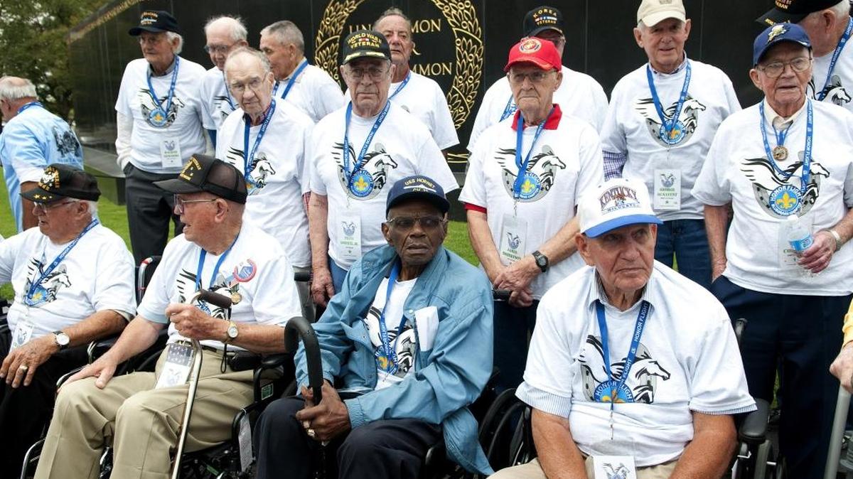 Several World War II and Korean War veterans from Kentucky and Indiana visited The Marine Corp War Memorial near Washington D.C., in 2012 as part of the Honor Flight program.