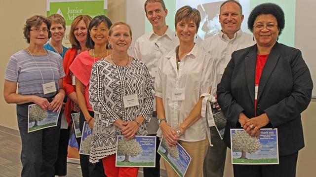 Receiving 10-year pins at the Junior Achievement appreciation luncheon were volunteers, from left, Katherine Leigh, Meagan Sisk, Karen Ecton, Hui-Nee See, Susan Cohen, Billy Lanter, Kelly Abraham, Greg House and Robin Harris, along with (not pictured) Craig Browning, Lora Knight and Tommy Roberts.