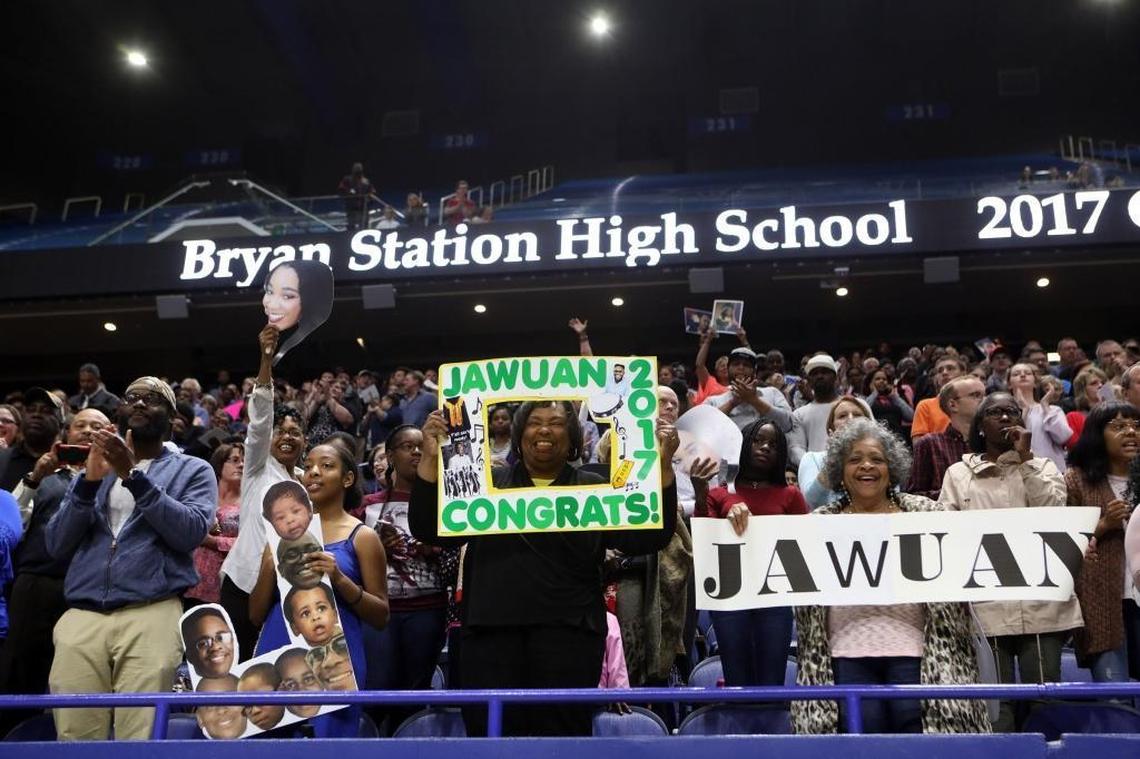 Family of JaWuan Walker Brown celebrates his big day during commencement exercises for Bryan Station at Rupp Arena May 25 .