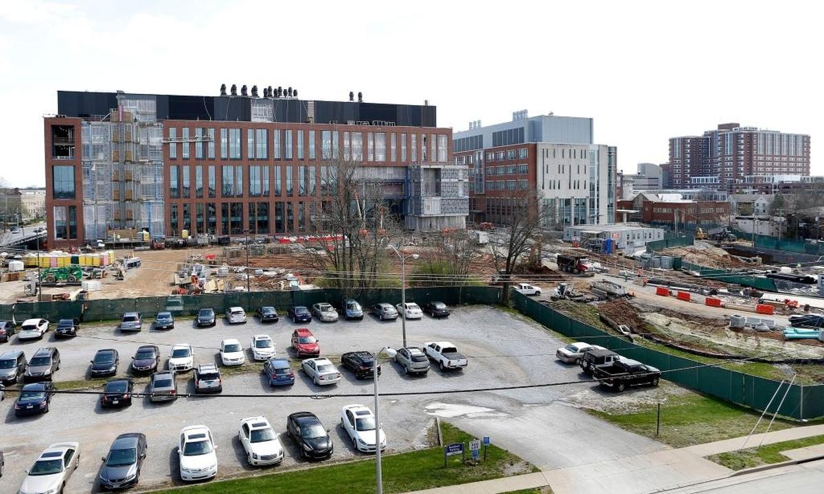 The new University of Kentucky research building is aimed at solving Kentucky’s worst health problems, including diabetes, cancer and heart disease. In the middle of the photo is UK’s College of Pharmacy and on the right is the UK Chandler Hospital.