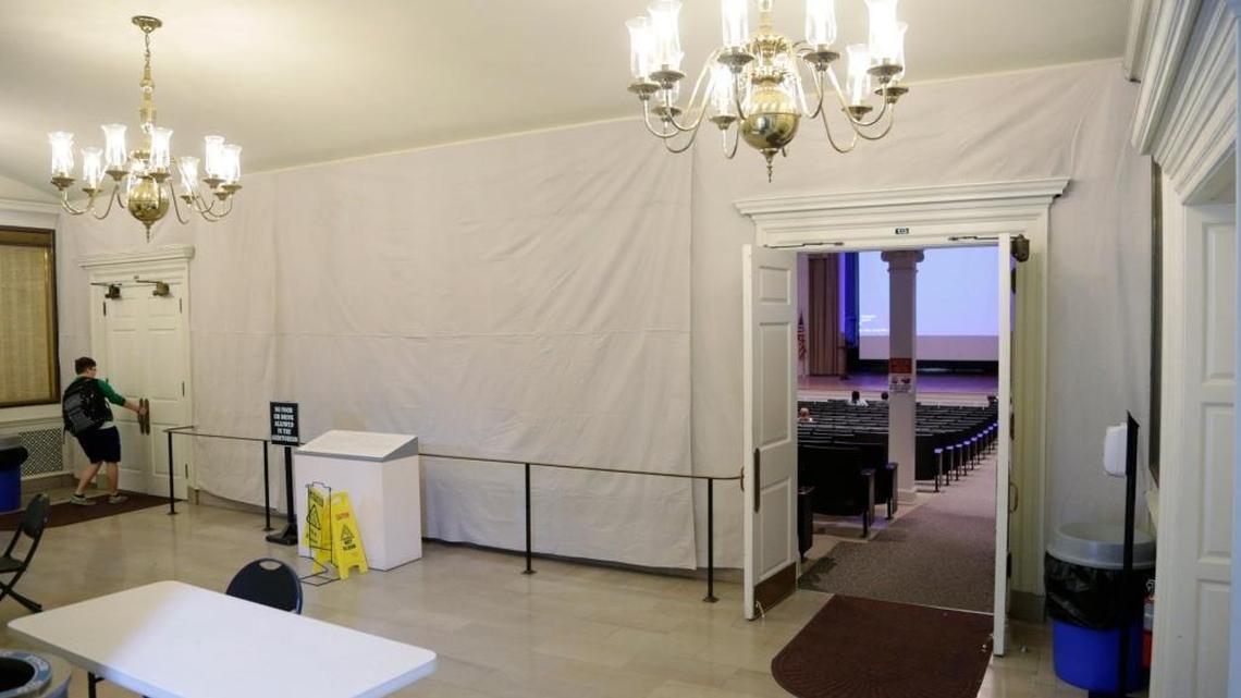 A mural by Ann Rice O’Hanlon in the lobby of Memorial Hall at the University of Kentucky has been covered.