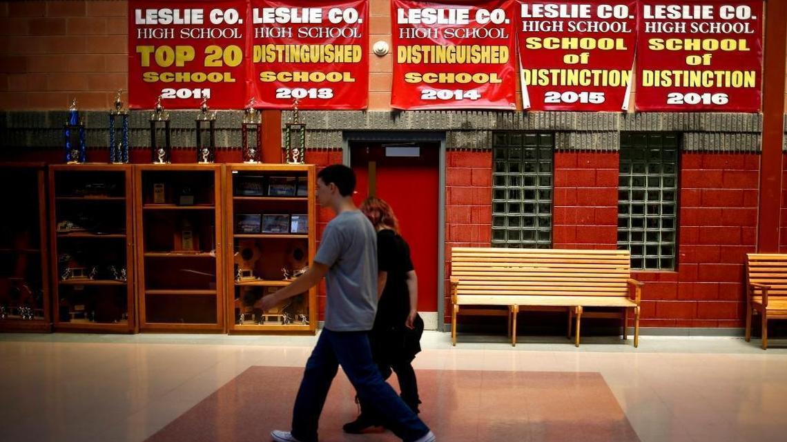Award banners cover the wall including Distinguished School in 2013 and 2014 and School of Distinction in 2015 and 2016 at Leslie County High School in Hyden. After taking hits of $1 million or more in a year from a combination of economic and demographic factors, Leslie County Schools are struggling to keep their doors open, though holding many academic accolades.