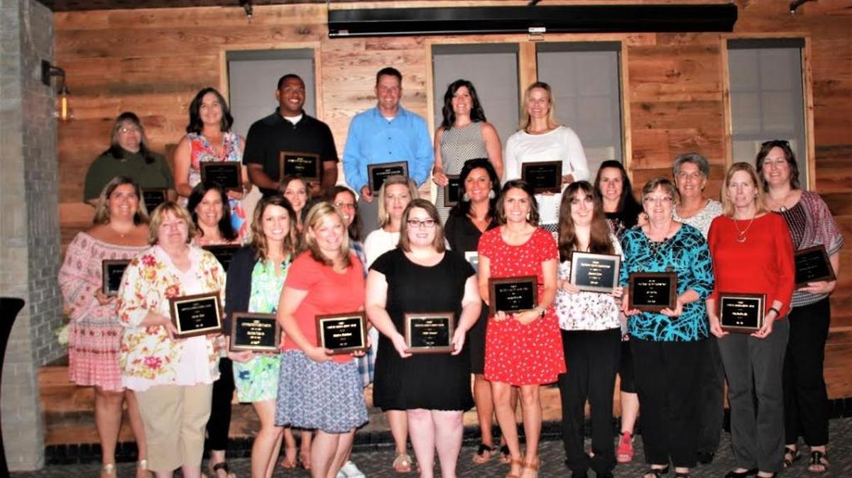 The following teachers received Central Kentucky Educational Cooperative Outstanding Educator Awards for their work with special education students: Top row, from left, Mellane Crowe, Danville Independent Schools; Tonia Darbro, Bourbon County Schools; Greg Foley, Danville Independent Schools; Kevin Crosby, Fayette County Schools; Erica Beegle, Fayette County Schools; Stacy Davis, Jessamine County Schools. Second row, from left, Molly Anderson, Fayette County Schools; Suzan Allen, Powell County Schools; Cara Harris, Fayette County Schools; Kaylyn Johnson, Scott County Schools; Elizabeth Ison, Mercer County Schools; Lindsay Pritchett, Anderson County Schools; Theresa Dobbins, Montgomery County Schools; Tess Wilson, Nelson County Schools; Millie Manuel, Paris Independent Schools; Shawn Foley, Jessamine County Schools; Margaret Smith, Bardstown Independent Schools; Joanne Tyler, Woodford County Schools; Kim Hall, Clark County Schools; Jill Settles, Washington County Schools; Cherie Chamberlain, Burgin Independent Schools; Marsha Royalty, Burgin Independent Schools; and Shannon Sparkman, Marion County Schools.