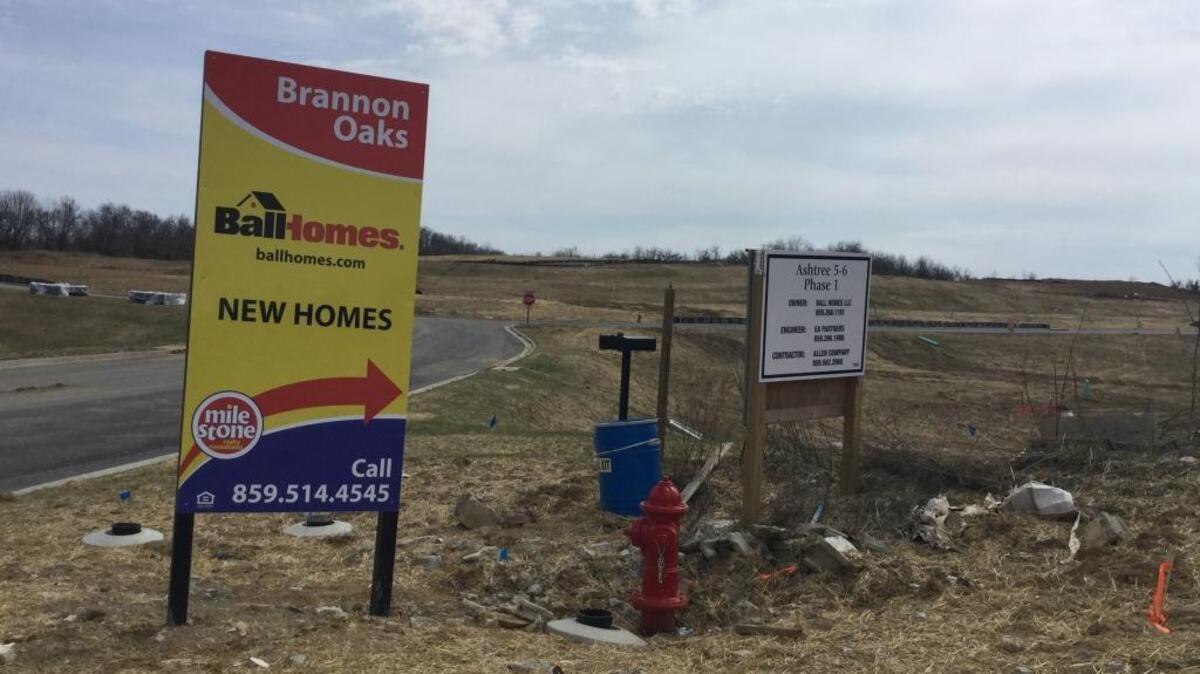 A sign advertised new homes that will be coming near the extension that will tie East Brannon Road to Tates Creek Road in northern Jessamine County.