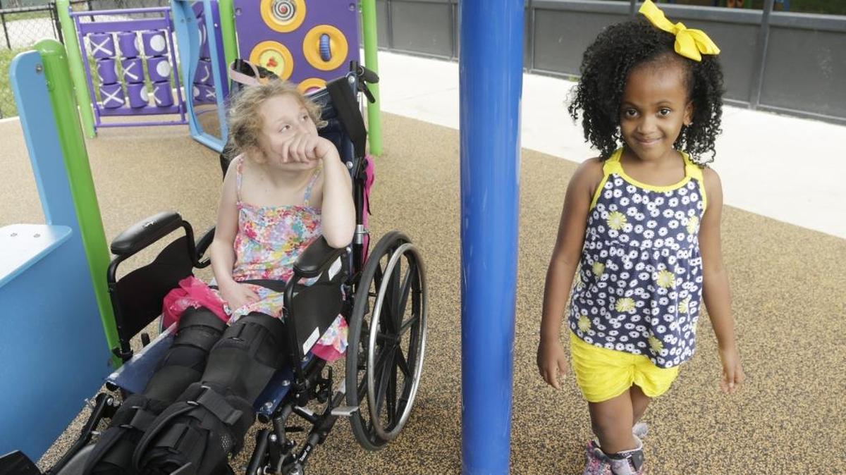 Addison Jones, 9, left, and Danielle Crenshaw, 7, took part in activities at Kidz Club on Regency Road in Lexington.