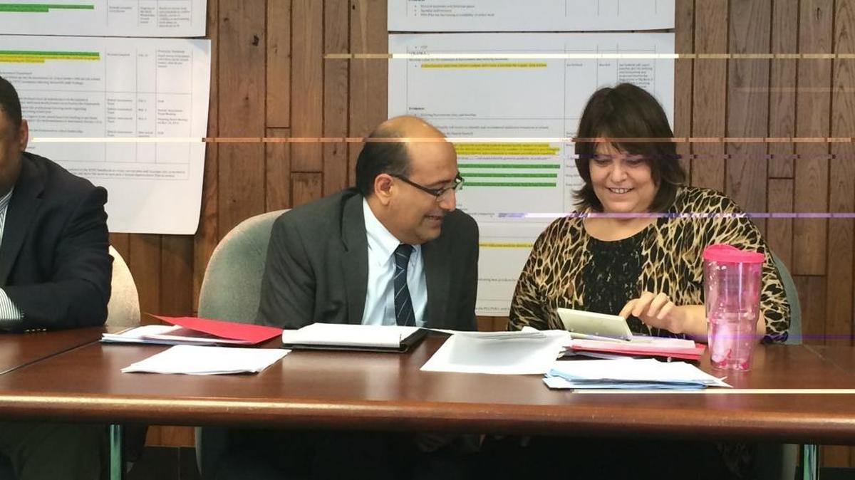 Hiren Desai, Fayette County Public Schools’ senior director of administrative services, left, and Budget Director Julane Mullins talked about the budget with the school board.