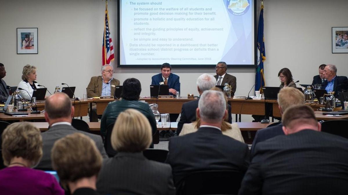 Members of the Kentucky Board of Education listen to a presentation from Rhonda Sims and Brian Gong during a Feb. 7 work session over the proposed new state accountability system.