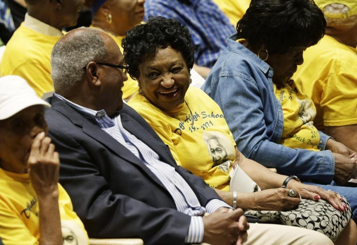 Manzel Bush and his mother, Marcella H. Bush, both alumni of the former Frederick Douglass school had a front row seat for the speakers during a ribbon cutting ceremony for the new Frederick Douglass High School Monday in Lexington.