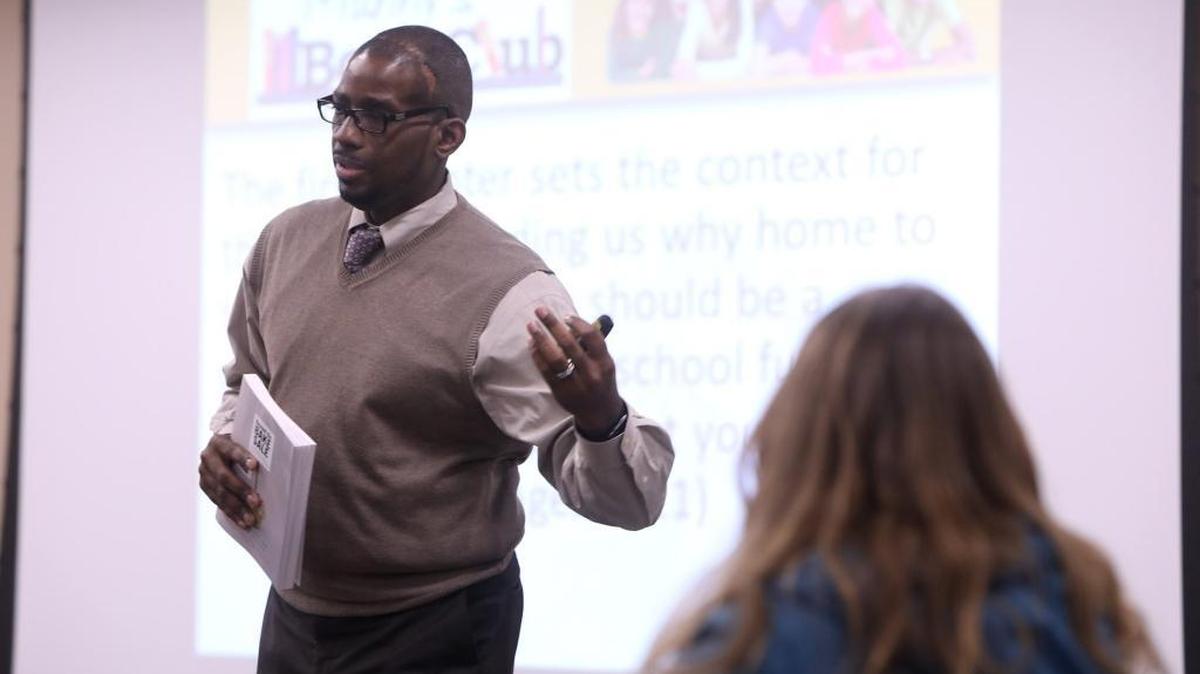 In this file photo, Fayettte County Superintendent Manny Caulk led his book club meeting at the Eastside branch of the Lexington Public Library.