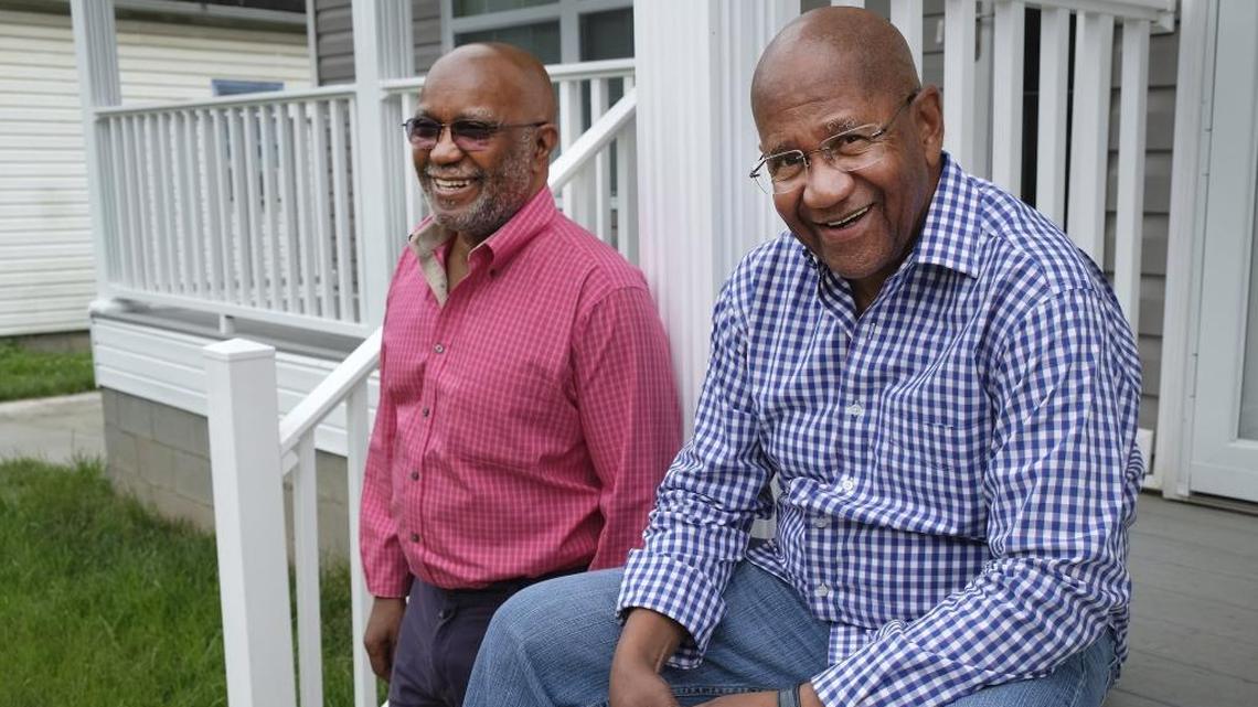 P.G. Peeples, President and CEO of Urban League of Lexington-Fayette County, talks about the organization's 50th anniversary. Peeples, right, poses with Norman Franklin, the organization's CFO and vice president of internal operations in 2017 on the steps of the one of the 260 affordable housing units the Urban League has built in Lexington.