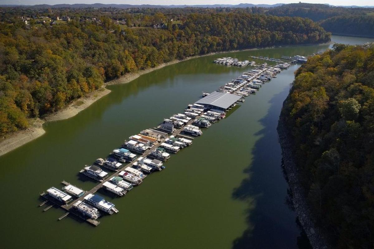 Dozens of houseboats sat docked at Lee’s Ford Resort Marina in Nancy on Oct. 31. The state property tax rate on houseboats is 1.5 cents per $100 value, while the rate on small boats is 45 cents per $100.