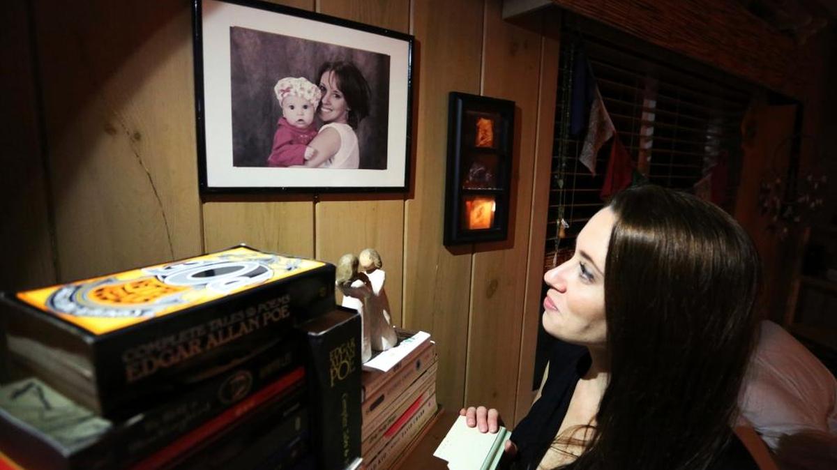 Casey Anthony looked up at a portrait of her with her daughter, Caylee, in her West Palm Beach, Fla., bedroom. The Florida woman who was dubbed by cable TV show hosts as “the most hated mom in America” after she was accused of killing her toddler says she still doesn’t know how the last hours of her daughter’s life unfolded.