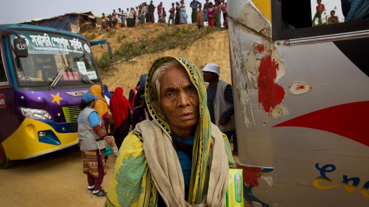 In this Jan. 14, 2018, photo, an elderly Rohingya refugee woman arrived with others at a transit camp in Kutupalong refugee camp near Cox’s Bazar in Bangladesh. Massacres, rapes and the wholesale destruction of villages by the Myanmar military in western Rakhine state have forced an estimated 700,000 Rohingya Muslims to flee to Bangladesh.