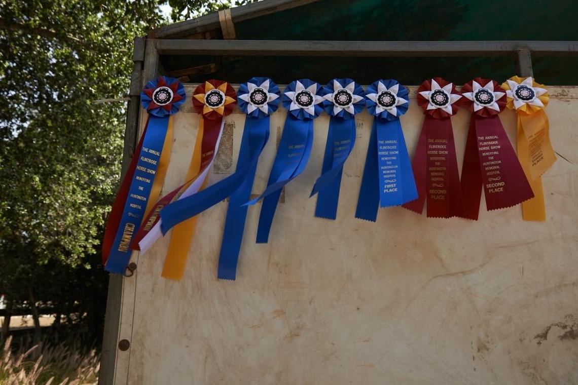 Ribbons hang on a stall at the Flintridge Riding Club in La Cañada Flintridge, Calif.