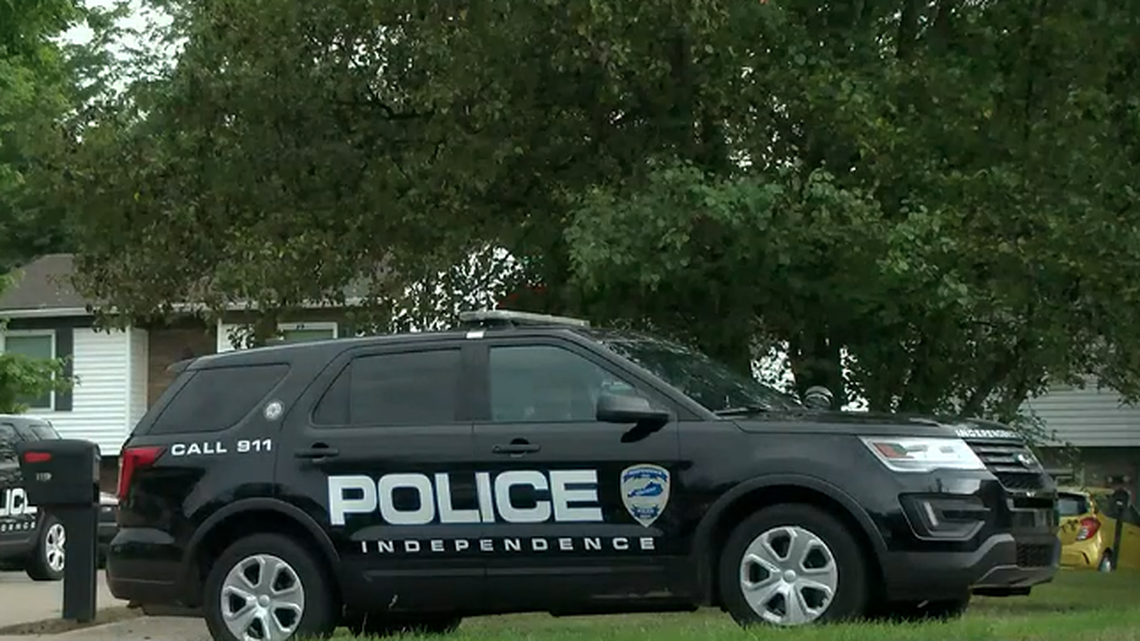 A mother has been arrested after police say she drove her son to and from a deadly shooting.