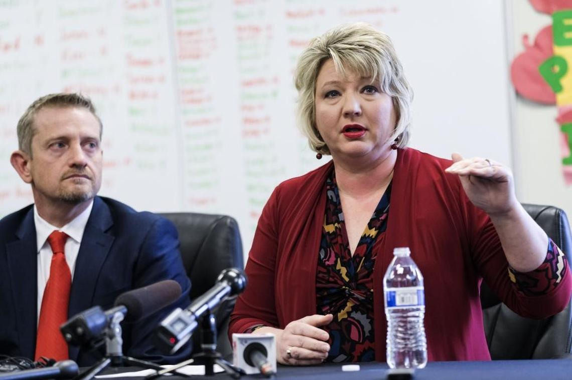 Kentucky Education Association President Stephanie Winkler tears up as she answers a question about student involvement and being thanked by a fourth grader at a rally protesting pension plan changes at the KEA headquarters in Frankfort, Ky. on Friday, March 30, 2018.