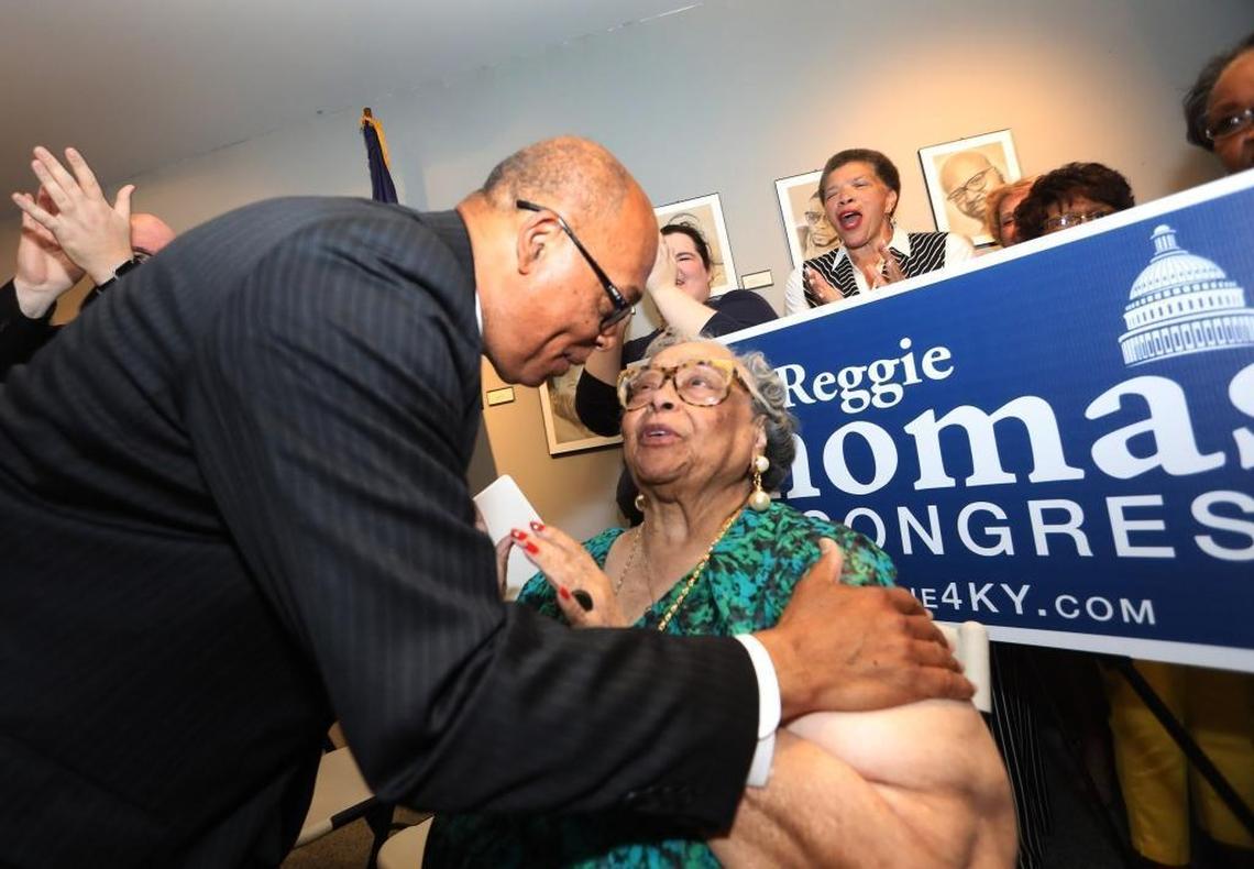 State Sen. Reggie Thomas hugged his mother, Wanda Thomas.