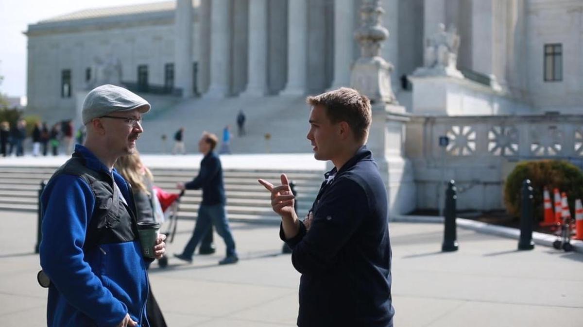 Louisville lawyer Dan Canon, left, and documentary director Alex Schuman talked in front of the U.S. Supreme Court in Washington in 2015. Canon was one of the attorneys for Kentucky couples who successfully challenged their state’s ban on same-sex marriages.