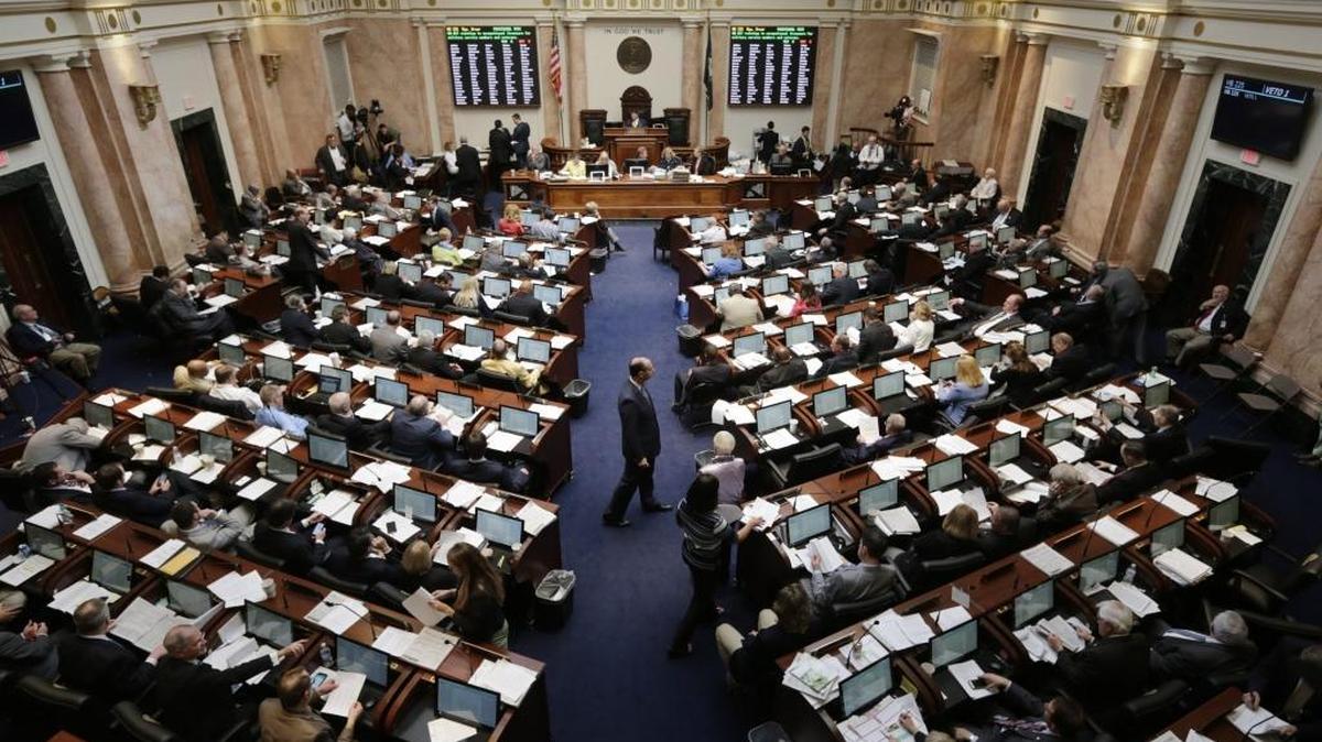 House Majority Leader Rocky Adkins, D-Flatwoods, walked across the aisle as representatives voted on HB 225 at the Capitol in Frankfort, Ky, on April 15, 2016.