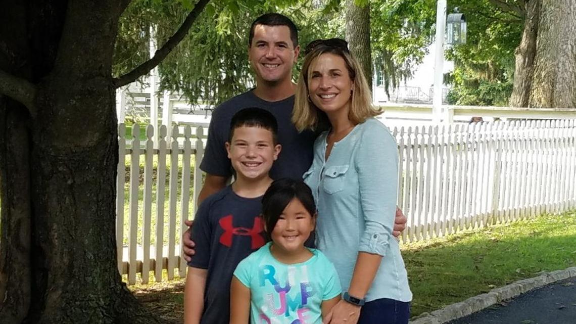 State Rep. David Meade, R-Stanford, and his wife, Rebecca, with their children, Caleb and Cara. The couple adopted Cara about 5 1/2 years ago.