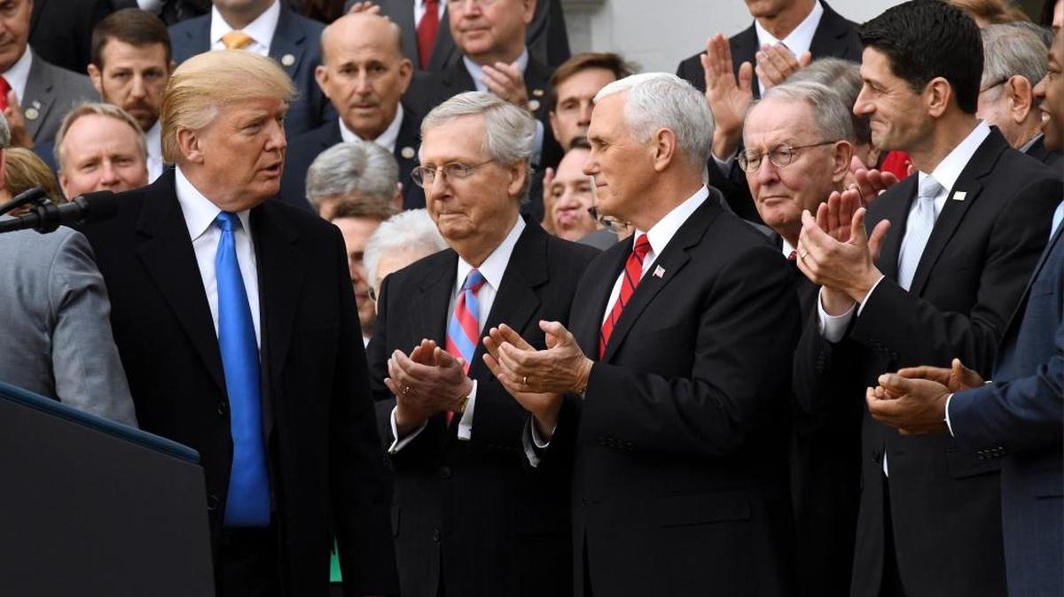 President Donald Trump, U.S. Senate Majority Leader Mitch McConnell, Vice President Mike Pence and Speaker of the House Paul Ryan were part of the White House celebration of the tax reform measure passed by the U.S. Congress Wednesday in Washington.