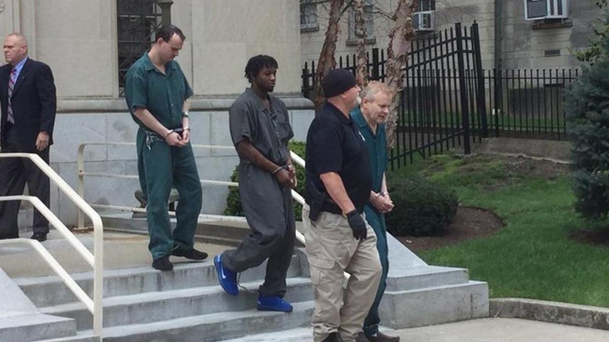 Disability benefits lawyer Eric C. Conn was led from the federal courthouse in Lexington on Thursday following a detention hearing. Conn has been in jail since his arrest Monday.