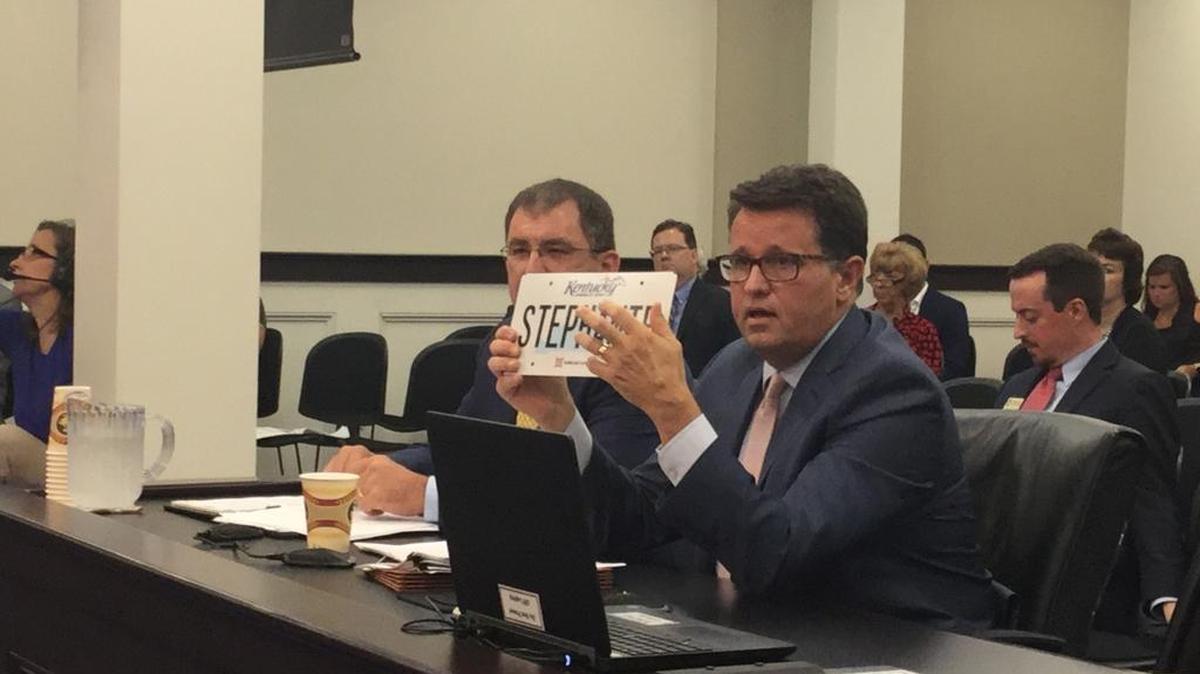 John-Mark Hack, who testified before a legislative committee last year about new license plates, departed in December 2017 as state vehicle regulation commissioner.