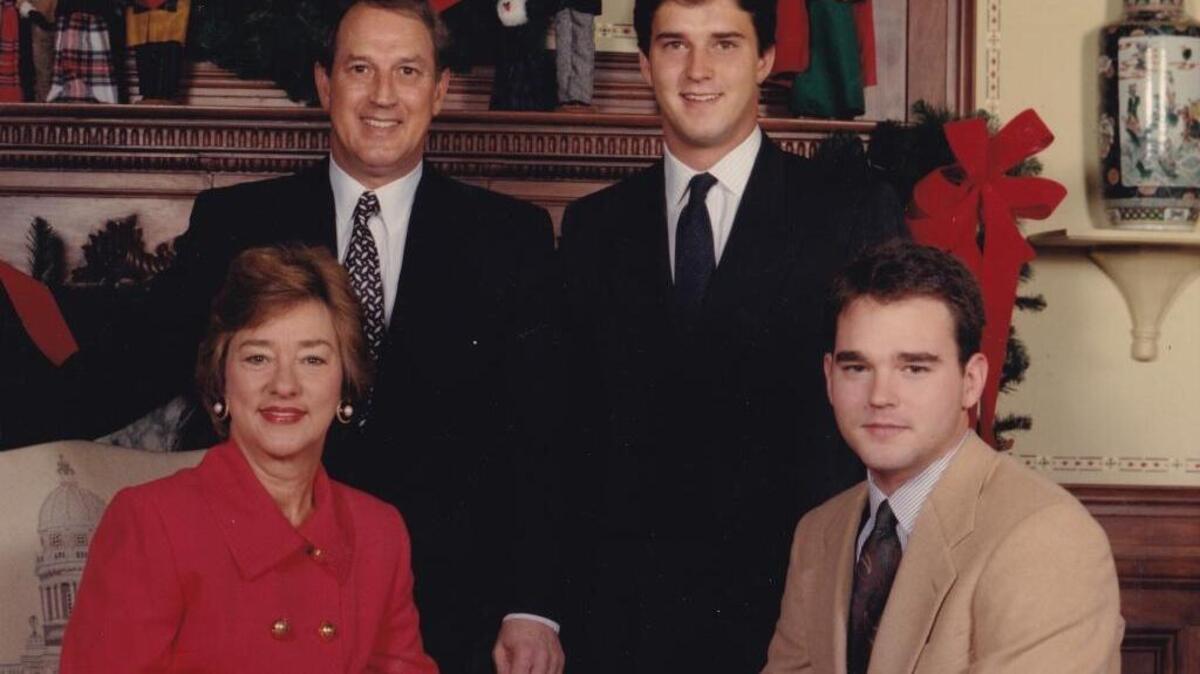 The Wilkinson family during the Christmas season in 1989. Gov. Wallace Wilkinson, first lady Martha Wilkinson and their sons, Glenn, standing, and Andrew.
