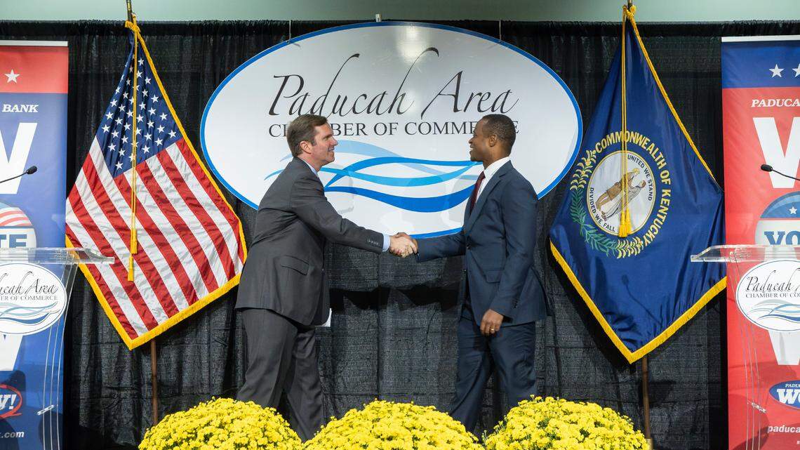 Democratic Gov. Andy Beshear, who is running for reelection, and Republican nominee and Kentucky Attorney General Daniel Cameron shake hands before the Paducah Area Chamber of Commerce’s Power in Partnership Luncheon and Gubernatorial Forum at the Paducah-McCracken County Convention Center in Paducah, Ky., on Thursday, Oct. 12, 2023.
