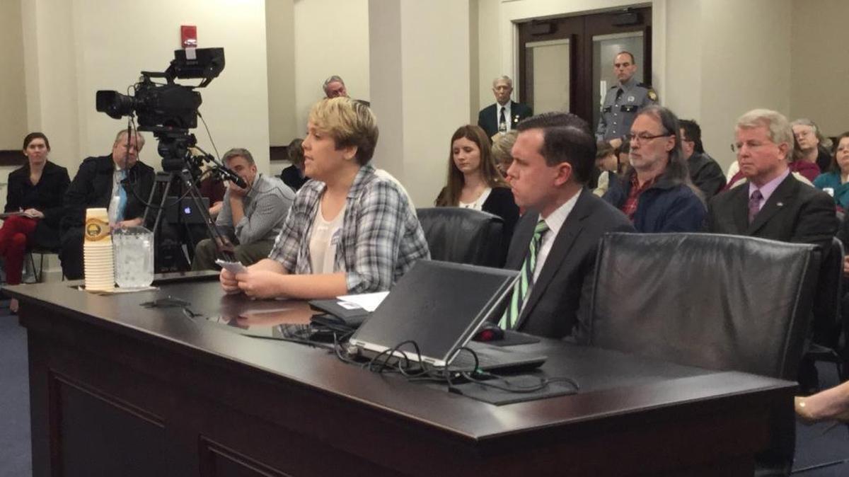 Rebecca Collett testifies to the House Judiciary Committee about difficulties in finding a job with a felony conviction on Jan. 13, 2016 in Frankfort, Ky. Russell Coleman, spokesman for Kentucky Smart on Crime, also testifies for the felony expungement bill.