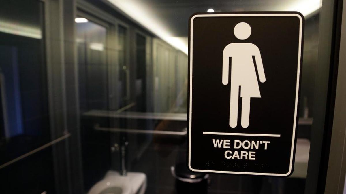 In the wake of controversy over proposed bathroom bills, a 21C Museum Hotel in Durham, NC, posted this sign outside its bathroom.