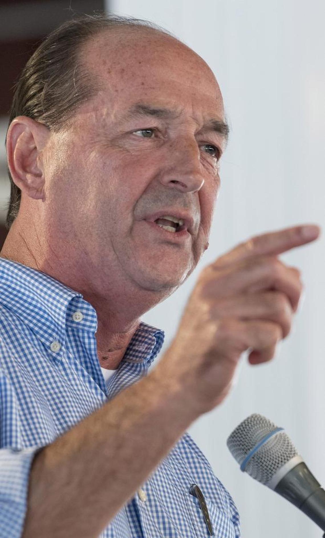 Kentucky House Minority Leader Rocky Adkins delivers his remarks during the political speeches at the Fancy Farm picnic Saturday August 5, 2017, in Fancy Farm, Ky.