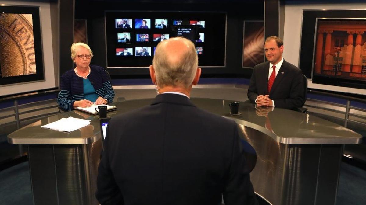 Democratic challenger Nancy Jo Kemper and U. S. Rep. Andy Barr, R-Lexington, and with moderator Bill Goodman prior to a televised debate at KET Studios in Lexington, Ky., Monday, Oct. 24, 2016.