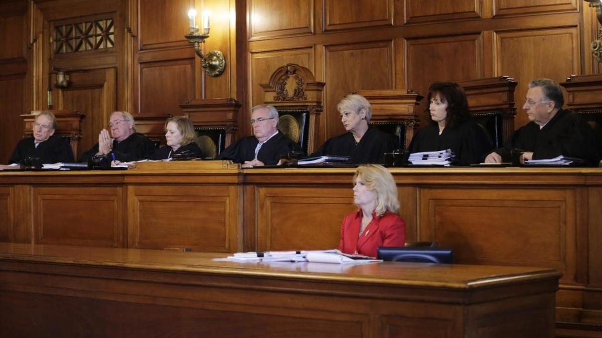 Justices listened to oral arguments before the Kentucky Supreme Court in the case of Attorney General Andy Beshear against Gov. Matt Bevin over whether Bevin is allowed to make mid-year budget cuts to state universities at Supreme Court Chambers at the Capitol in Frankfort, Ky, on Aug. 18, 2016.