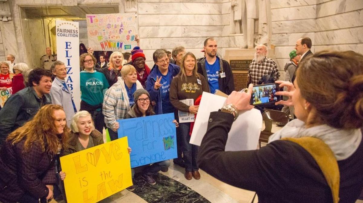 A group from Elizabethtown posed for a group photo at the statewide Fairness Rally held in the rotunda of the Kentucky State Capitol on Wednesday Feb. 17, 2016 in Frankfort, Ky.